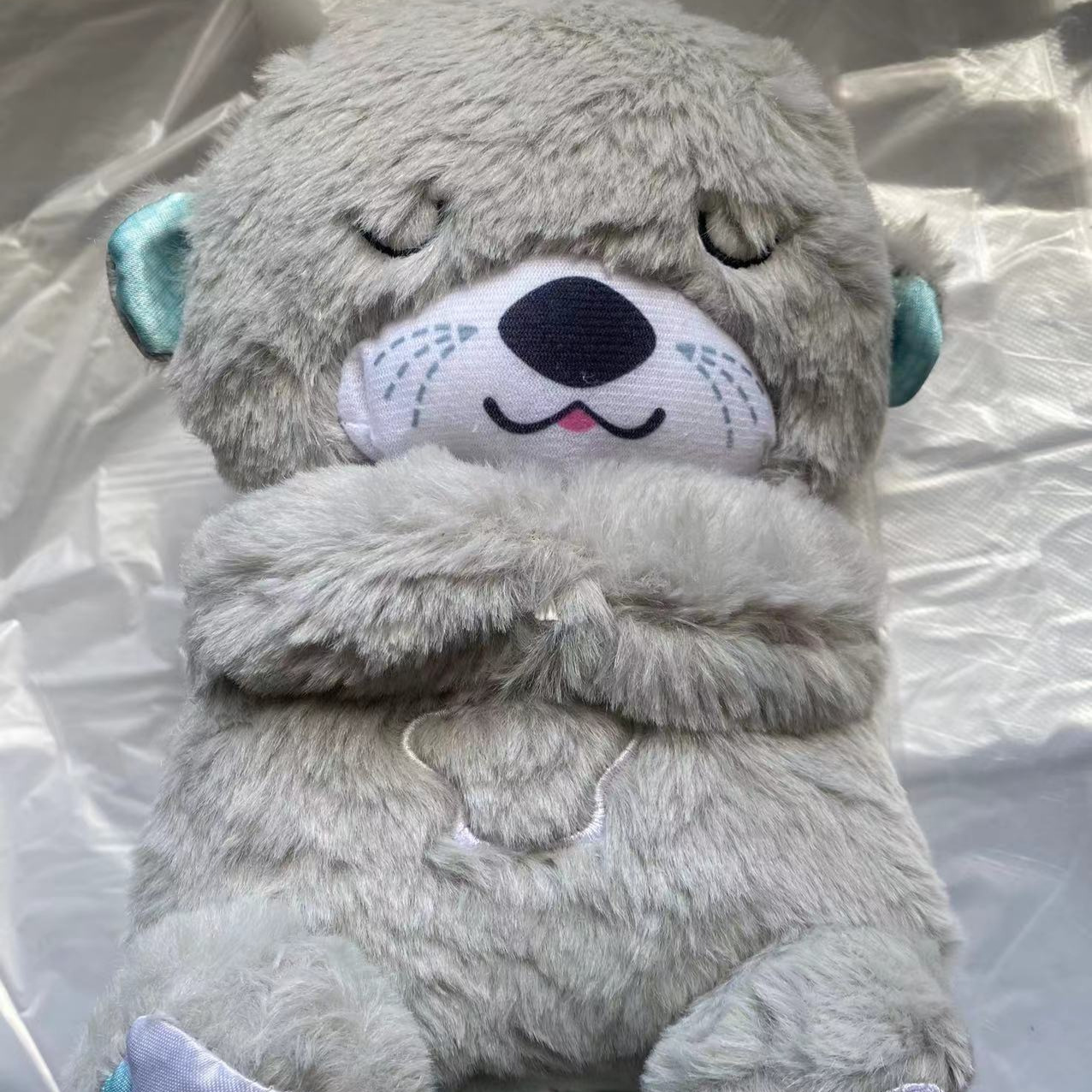 眠りを誘う呼吸するクマの仲間 カワウソクマぬいぐるみおもちゃ 赤ちゃん子供用なだめる音楽人形 クロスボーダー