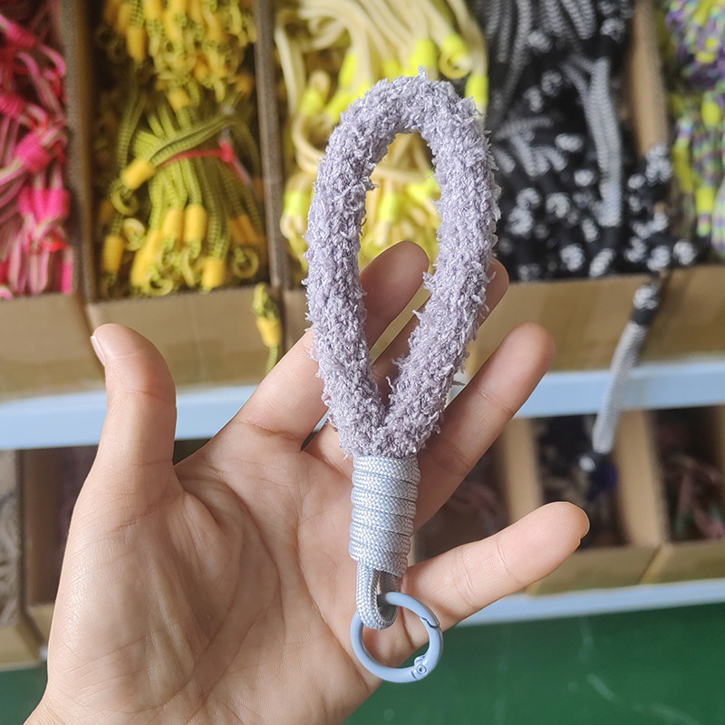 新しい色の手編みの蝶結びのキーホルダーの紐の学生のカメラのかわいいカップルのリュックサックの飾りの紐|undefined