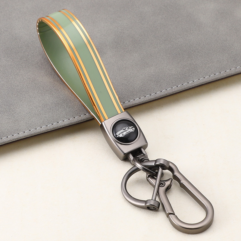 Cuerda de mano de silicona transfronteriza llavero de coche logotipo de coche apellido llavero anti-pérdida llavero de cuerda de mano de silicona duradera