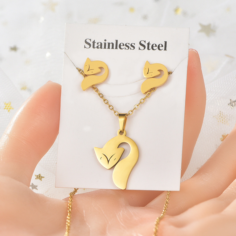 INS transfronteriza de acero inoxidable chapado en oro no es fácil de desvanecerse animal amor collar pendientes amor joyería de titanio traje de acero