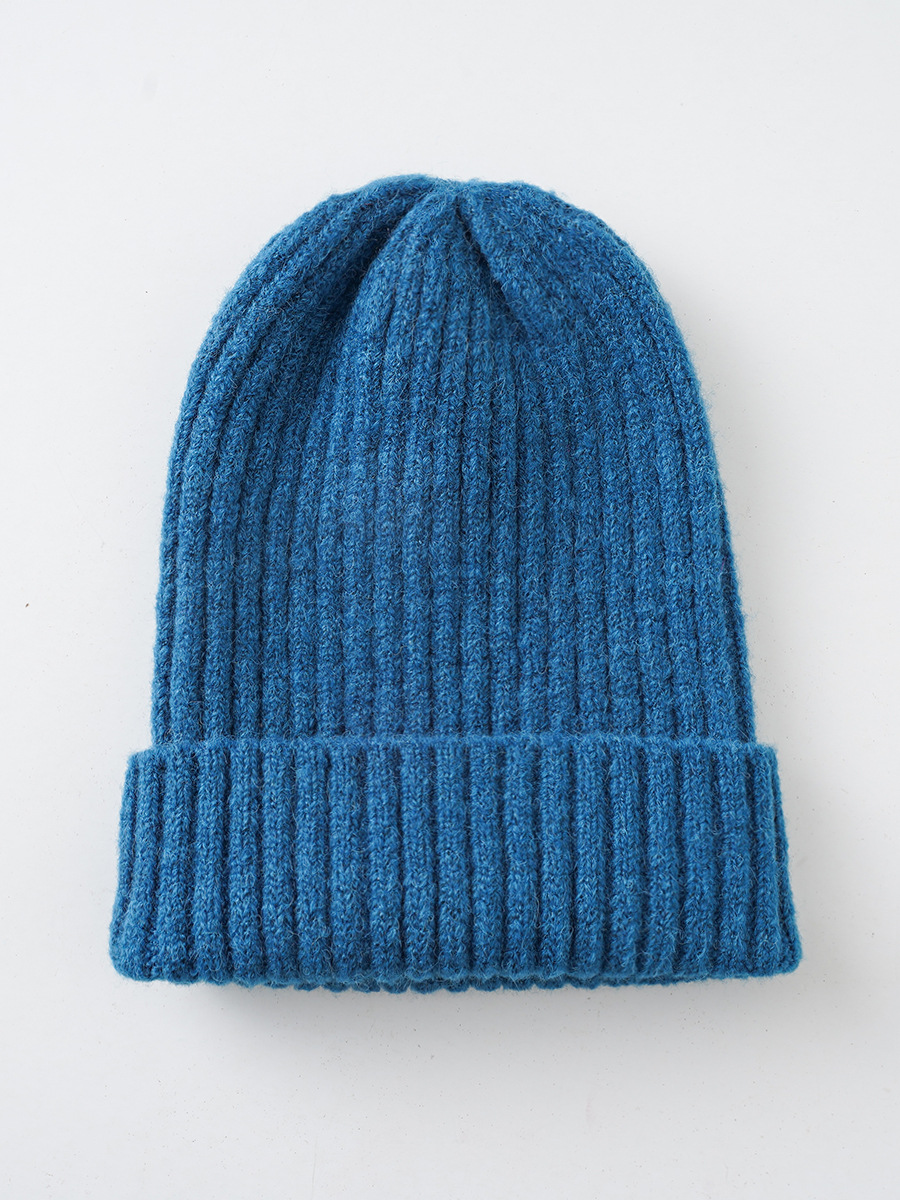 Sombrero de invierno de las mujeres estilo coreano nuevo color caramelo color sólido sombrero de lana cálido sombrero de punto de rayas verticales moda