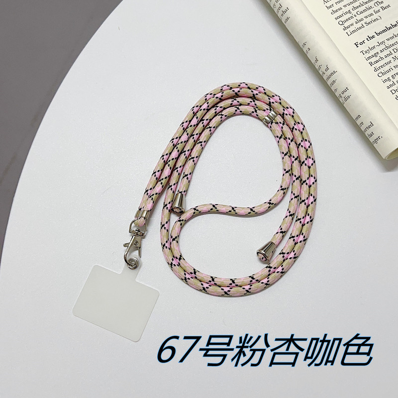 携帯ケースにナイロンのストラップが貼られています。|undefined