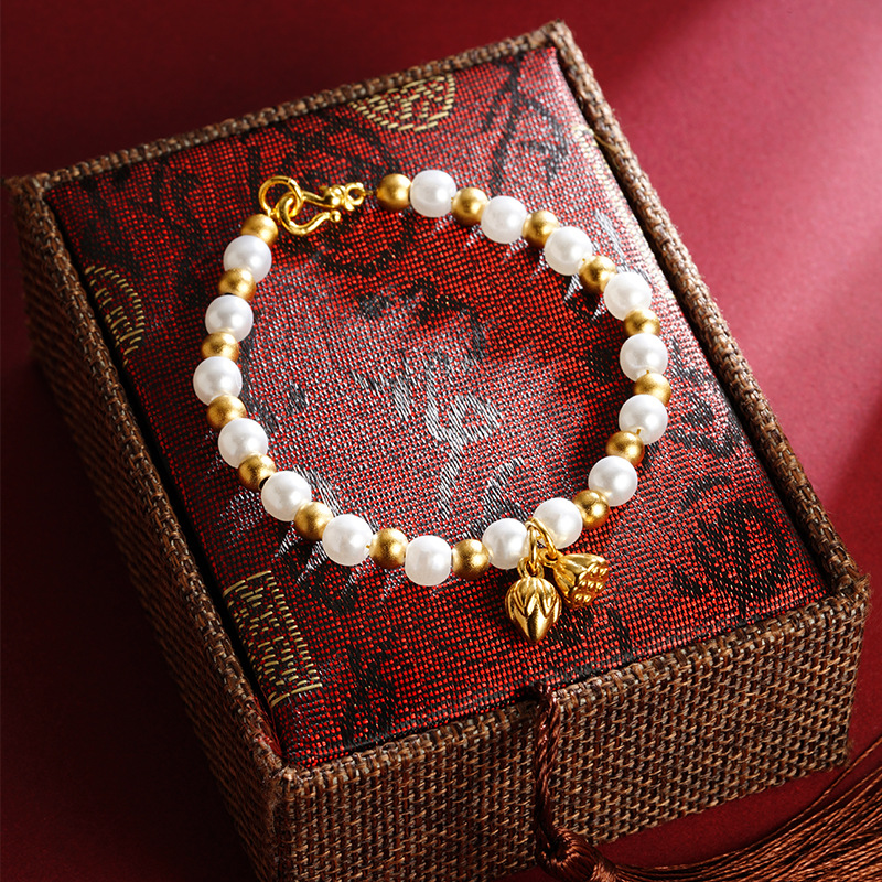 Pulsera de loto de oro de Gufa Sha imitación de perlas de aleación de cobre esferas ligeras de lujo Yiwu joyería suministro directo al por mayor