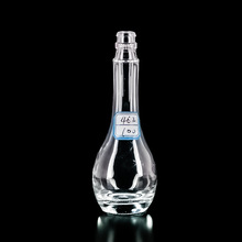 供應批發100毫升透明玻璃瓶 廠家生產二兩小酒瓶 長頸圓肚白酒瓶