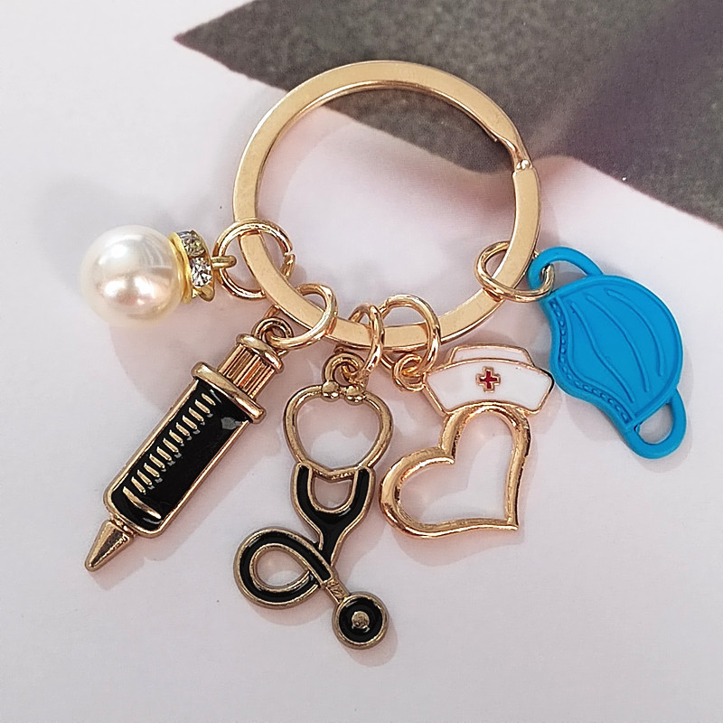 Llavero médico nuevo transfronterizo enfermera doctor jeringa estetoscopio personal