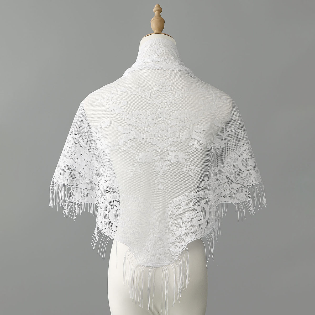 Cross-border best-selling new foreign trade lace shawl headscarf hollow triangle scarf European and American solid color tassel fashion shawl for women