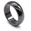 Magnetic glossy black fashionable ring, on index finger