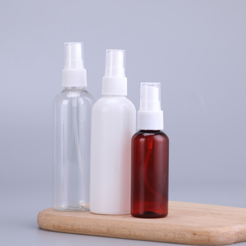 Botella de spray 30/50/100ml Botella de spray lateral transparente PET Botella de spray hidratante de alcohol pequeña Botella de spray de niebla fina portátil
