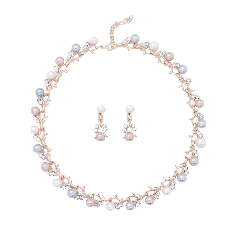 Europeo y americano nuevo estilo de lujo ligero nicho diseño retro moda perla clavícula cadena colgante collar pendientes de dos piezas conjunto