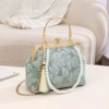 Blue handheld bag strap pearl