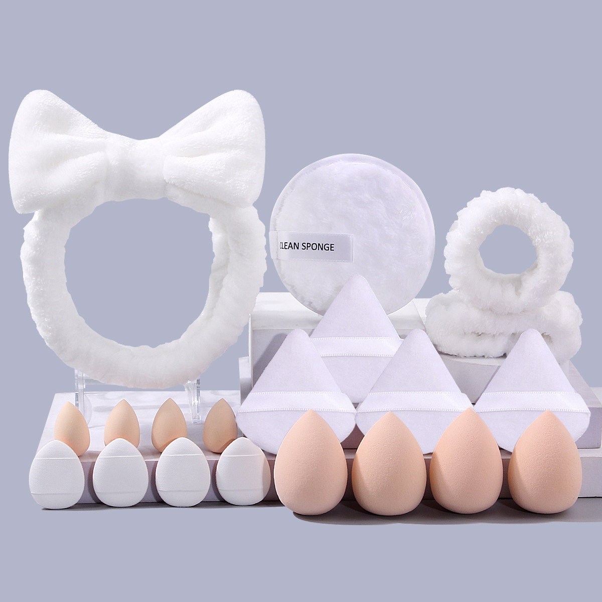 Explosiones transfronterizas desmaquillaje triángulo pulgar polvo conjunto correa de cabello combinación de huevo de maquillaje lavado de la cara esponja absorción correa de muñeca