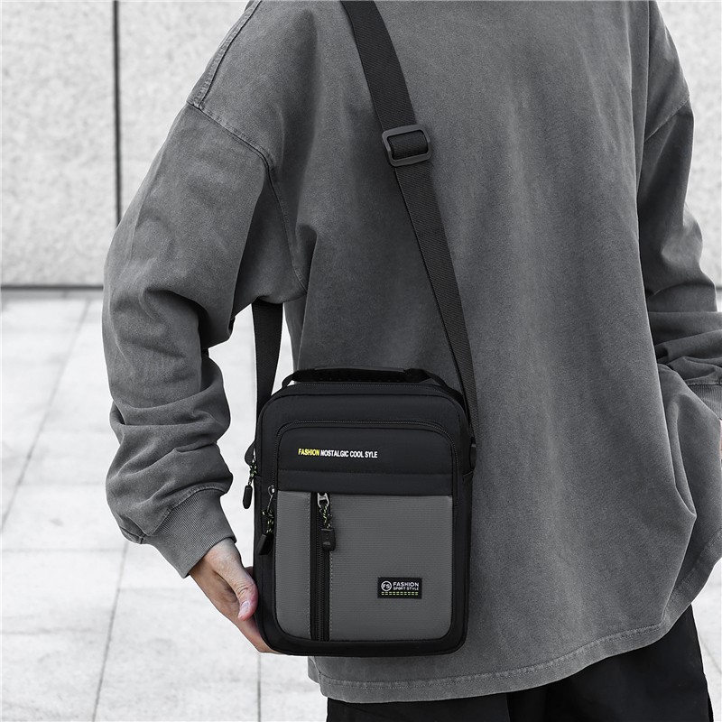 Comercio exterior nuevo bolso de hombro de moda para hombres, bolso de mano de viaje simple, bolso de hombro práctico tridimensional versátil