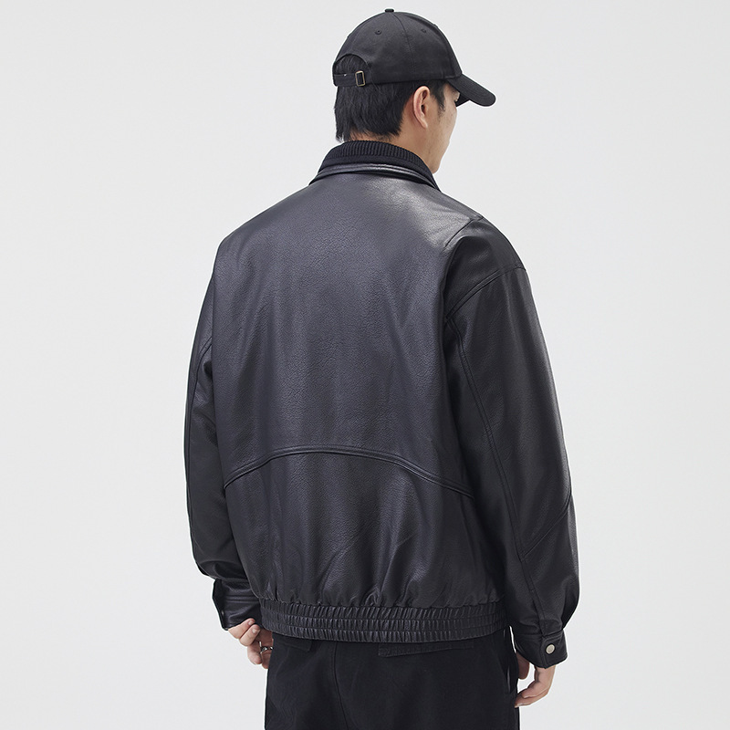 Falso de dos piezas de chaqueta de plumón con solapa de cuero PU para hombres 2025 invierno nuevo estilo casual suelto guapo chaqueta de diseño plumón