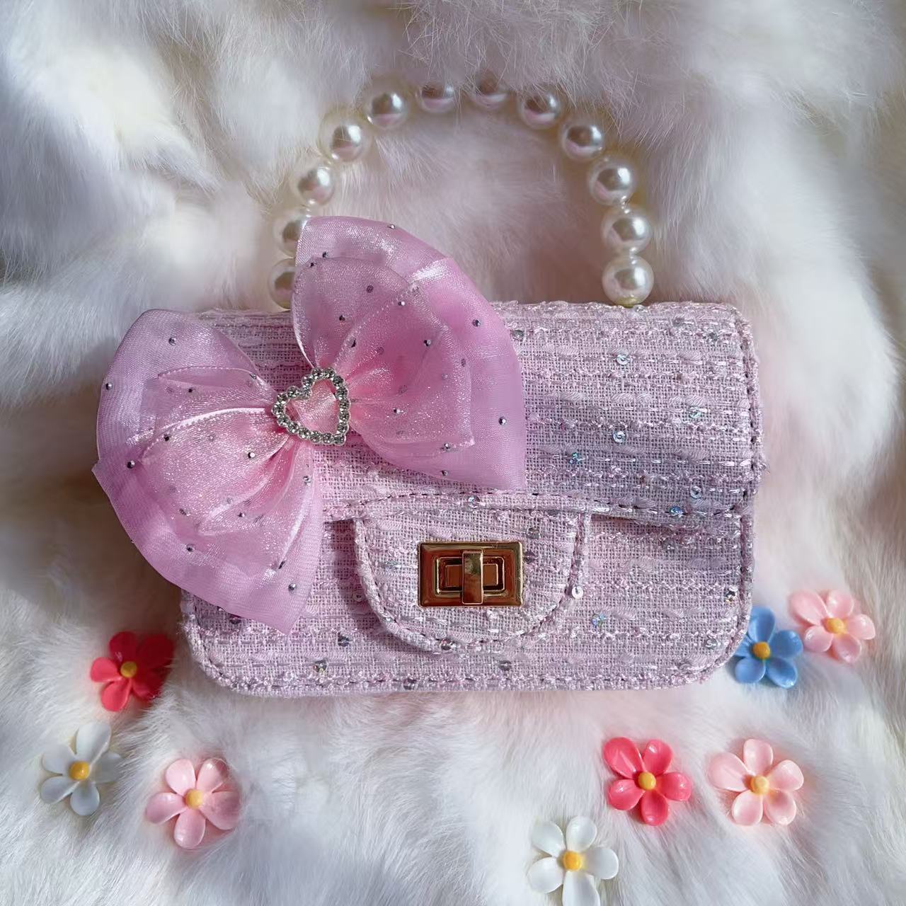 Nuevo tipo de bolsos para niños, bolsos de moda, bolsos de princesa de viento, bolsos portátiles lindos para chicas, bolsos de red para bebés.