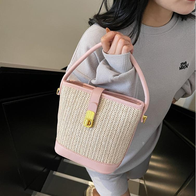 Bolsa de mano de tejido de verano super caliente para mujeres 2025 nuevo bolso de playa de vacaciones de alta calidad bolso de cubo de ocio