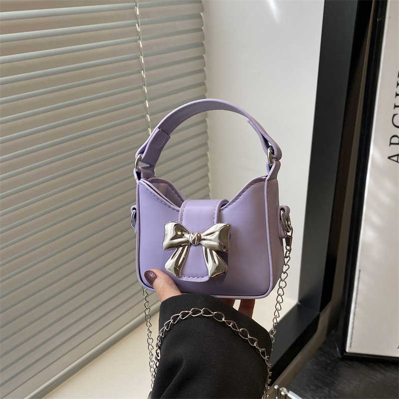 Bolsas para niños nuevas niñas color caramelo arco mini bolsos de mano niñas cadenas de padres e hijos bolsos de lápiz labial