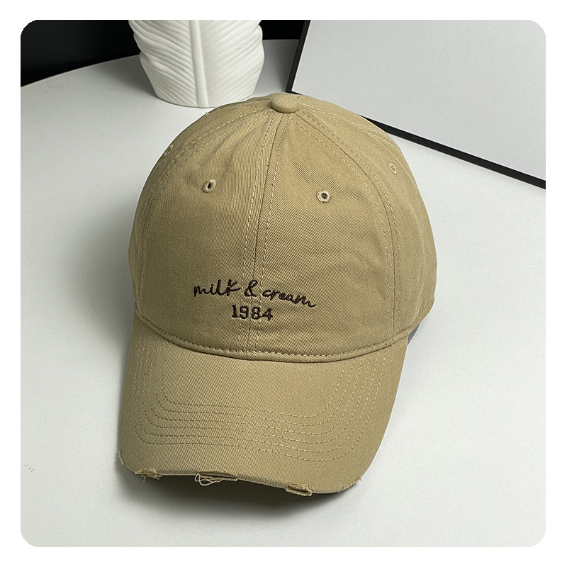 agujero nuevo sombrero de béisbol bordado de letras mujer simple cara pequeña gorra de lengua de goma ancha primavera y verano sombrero de pareja hombre