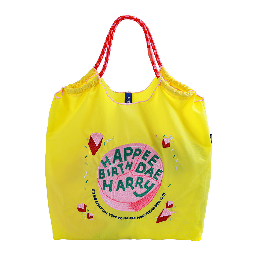Bright yellow birthday cake
