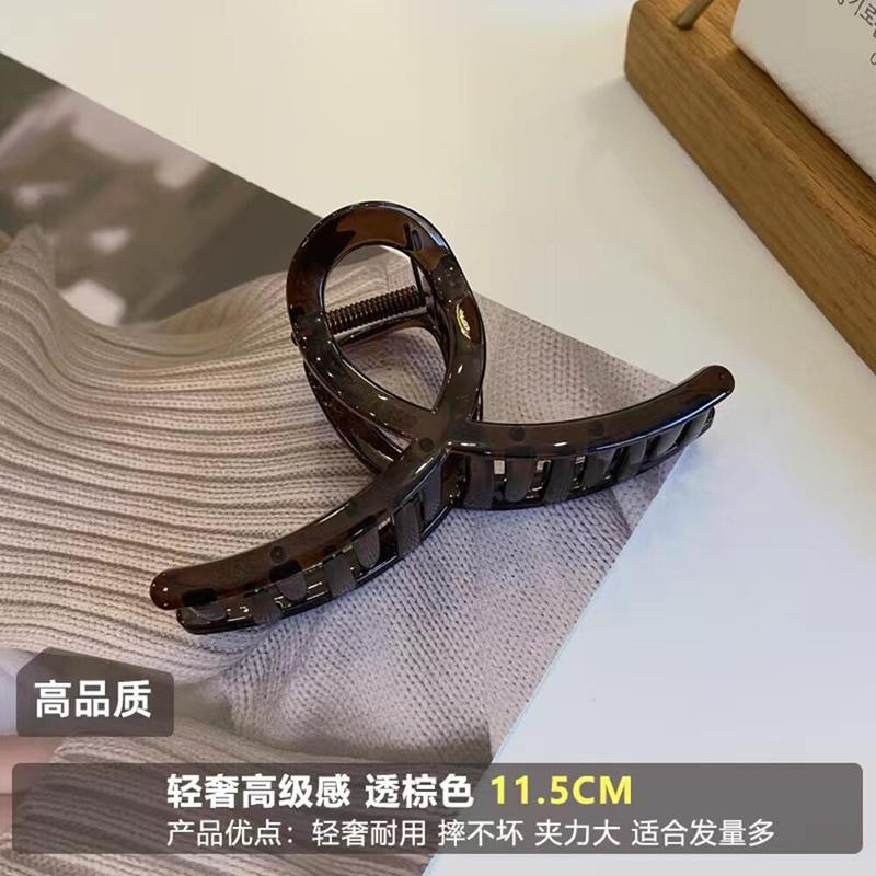 韓国のレイ透の黒いクリップの髪の質感はシンプルです。|undefined