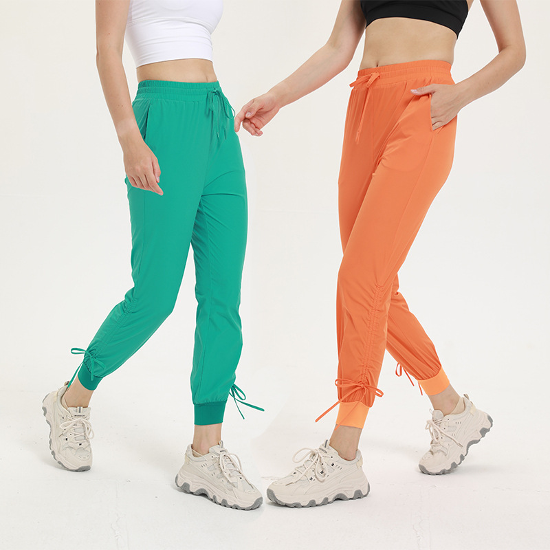 瑜伽服厂家吸湿排汗速干运动裤女生瑜伽裤宽松夏季长裤束脚瑜伽裤