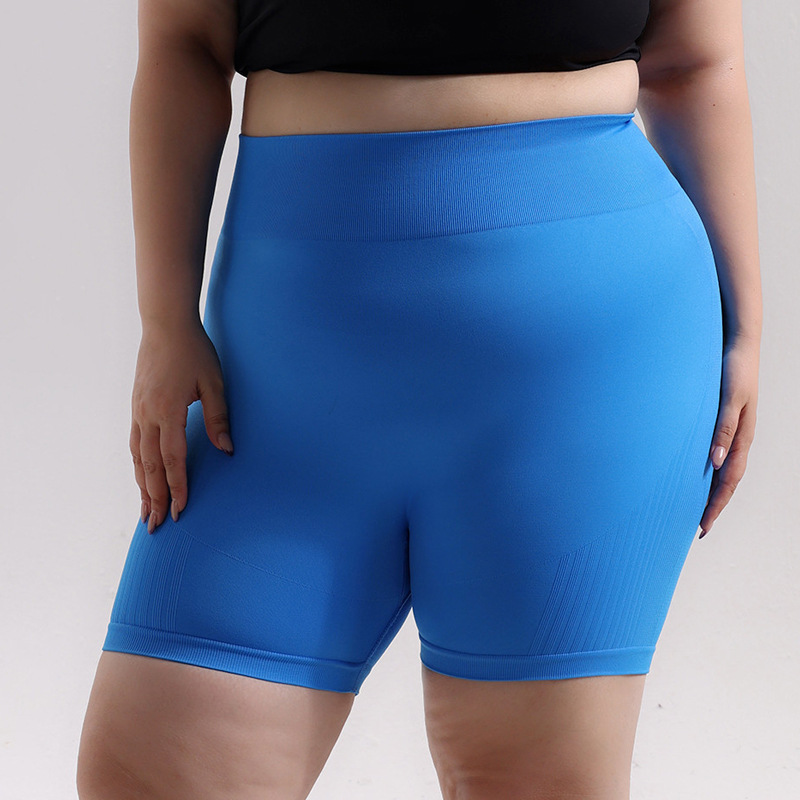 Pantalones cortos de cadera de melocotón deportivos sin costuras de gran tamaño europeos y americanos