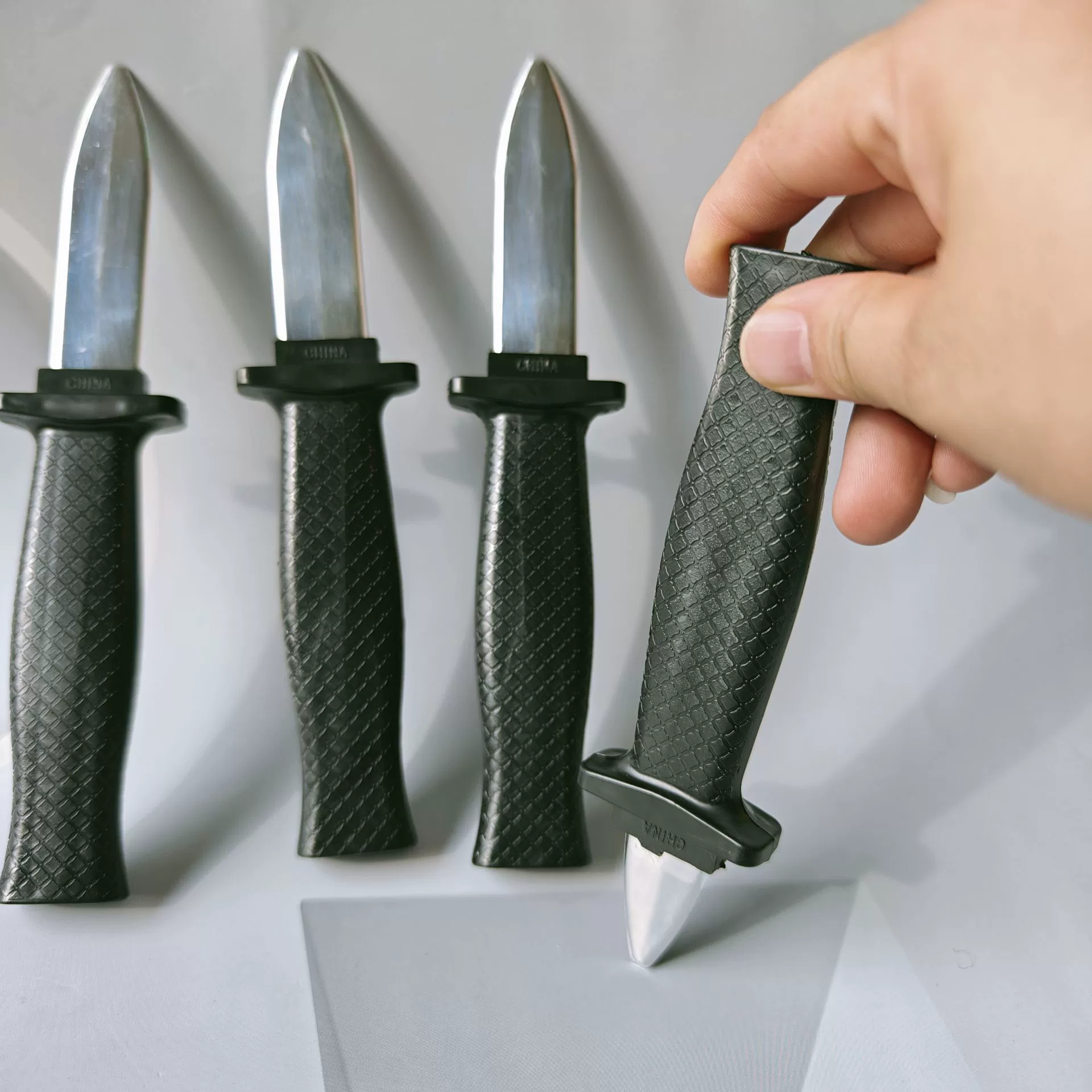 Детские игрушки, пластиковый пружинный нож, телескопический пластиковый кинжал, поддельный нож, реквизит, 1 юань, уличный киоск, поставка оптом