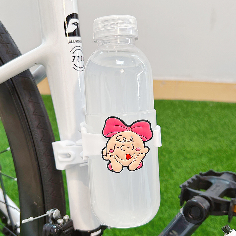 自転車のコップの棚のかわいい漫画のハンドルの多機能のオートバイの電気自動車は通用して飲み物の水筒のブラケットを入れます。|undefined