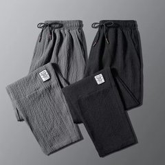 仕事のズボンの男性は耐磨耗性があります。