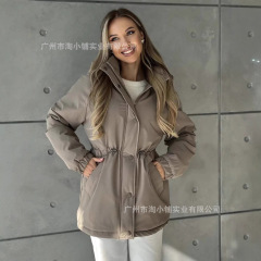 綿のダウンジャケットの婦人服の新型のアメリカ式の工装のコートの女性の新型のゆったりしているレジャーの百合は腰の中の長いタイプの綿の服を収めます。