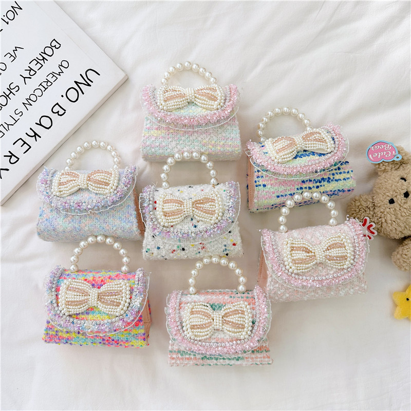 2025 otoño y invierno nuevo arco de perlas de arco de perlas bolsas de niños de tween lindas caricaturas princesa mochila