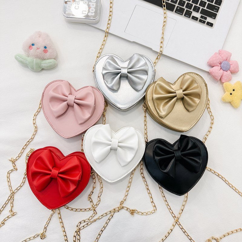 Bolsa de hombro para niñas coreanas dulce amor extranjero arco de arco bolso de mochila para niños nueva moda bolso de cadena para niños