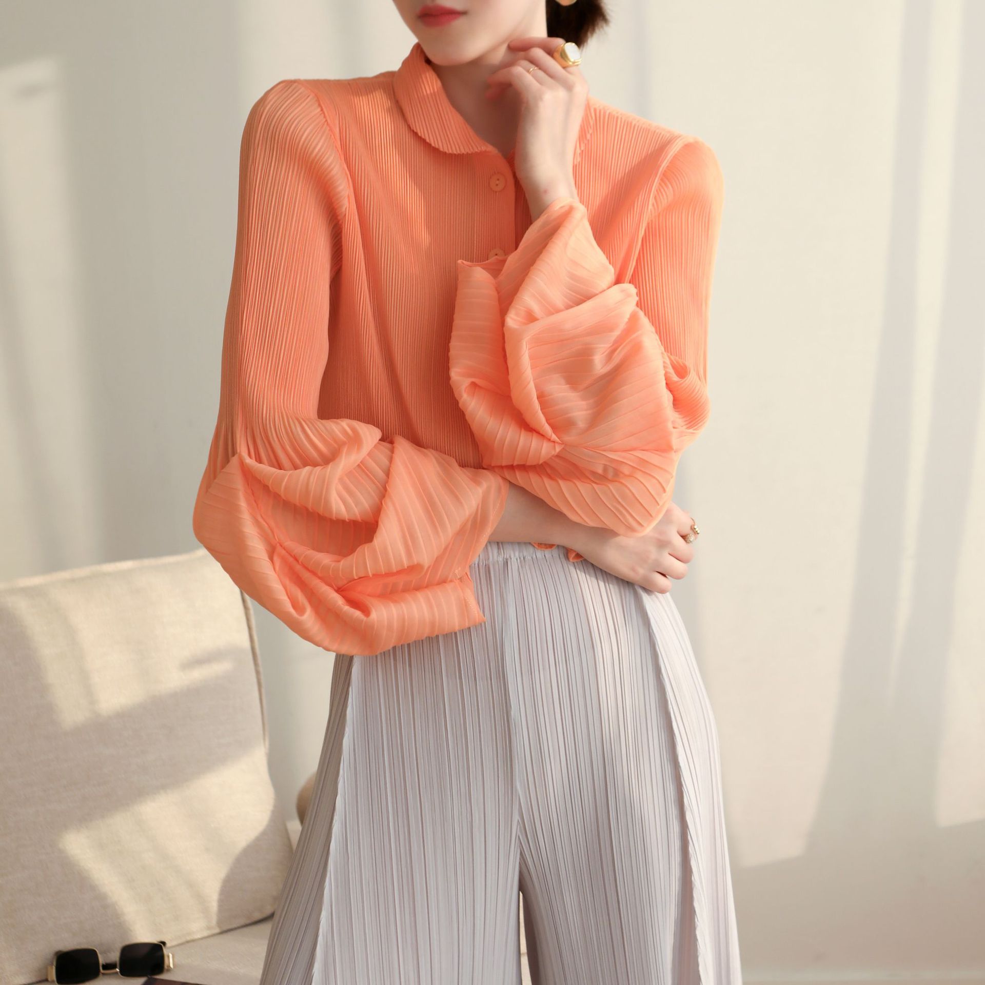 Otoño y primavera nueva llegada estilo de gama alta plisado puff mangas de moda de gama alta adelgazamiento temperamento pequeños pliegues superiores