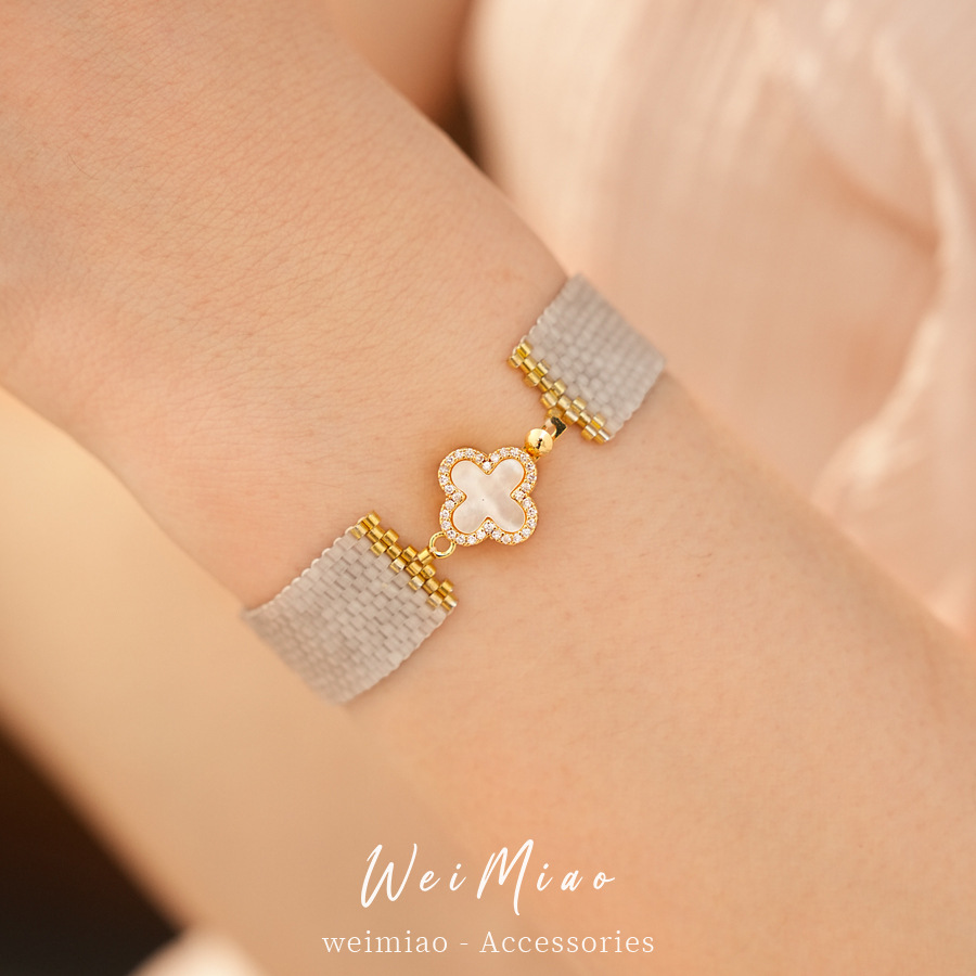 Zircón con cuentas, flor de hierba de la suerte, pulsera ligera de lujo, pulsera de nicho, personalidad temperamento de alta calidad, joyas al por mayor