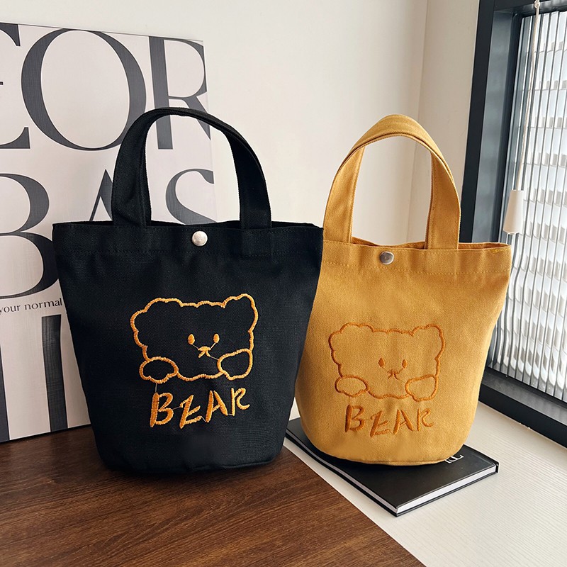 Personalized ladies' bucket bag, versatile and cute canvas bear wholesale, simple Japanese style new handbag undefined