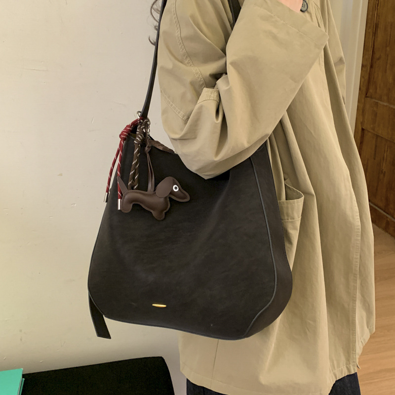 BENL alta sensación de bolso de invierno para mujeres 2025, nuevo tipo de gran capacidad, bolso de cubo de transporte, bolso de hombro de viaje