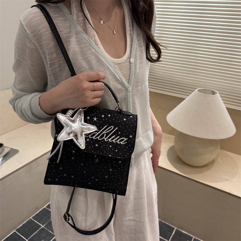 Mochila de moda coreana Full Sky Star 2026 nuevo estilo coreano estilo académico letras versátiles mochila de mano casual