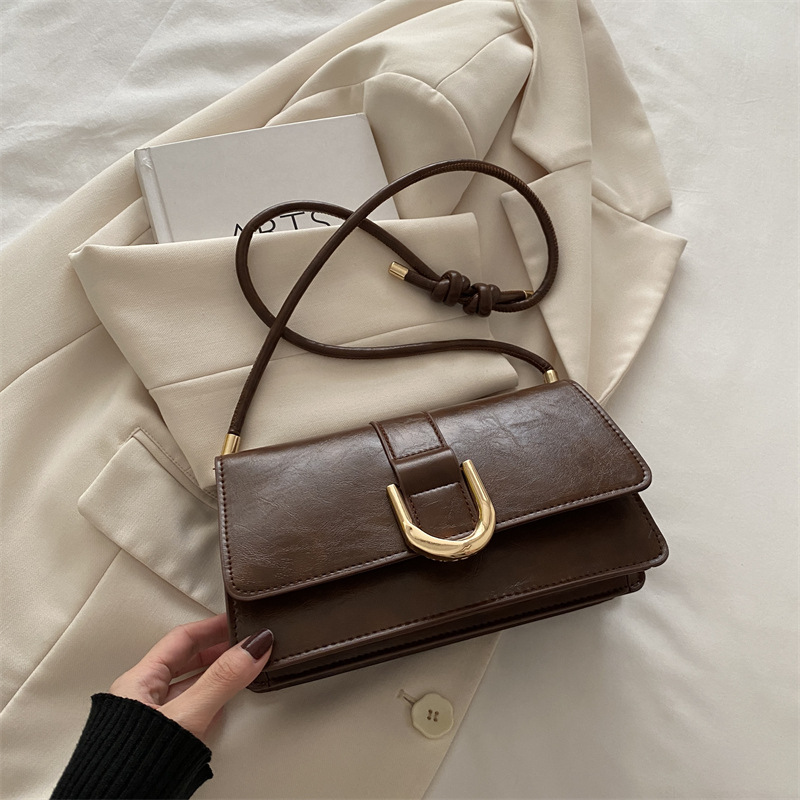 Diseño francés de nicho retro bolso debajo de la axila para mujeres 2024 otoño y invierno nuevo paquete de mano de hombro de alta calidad