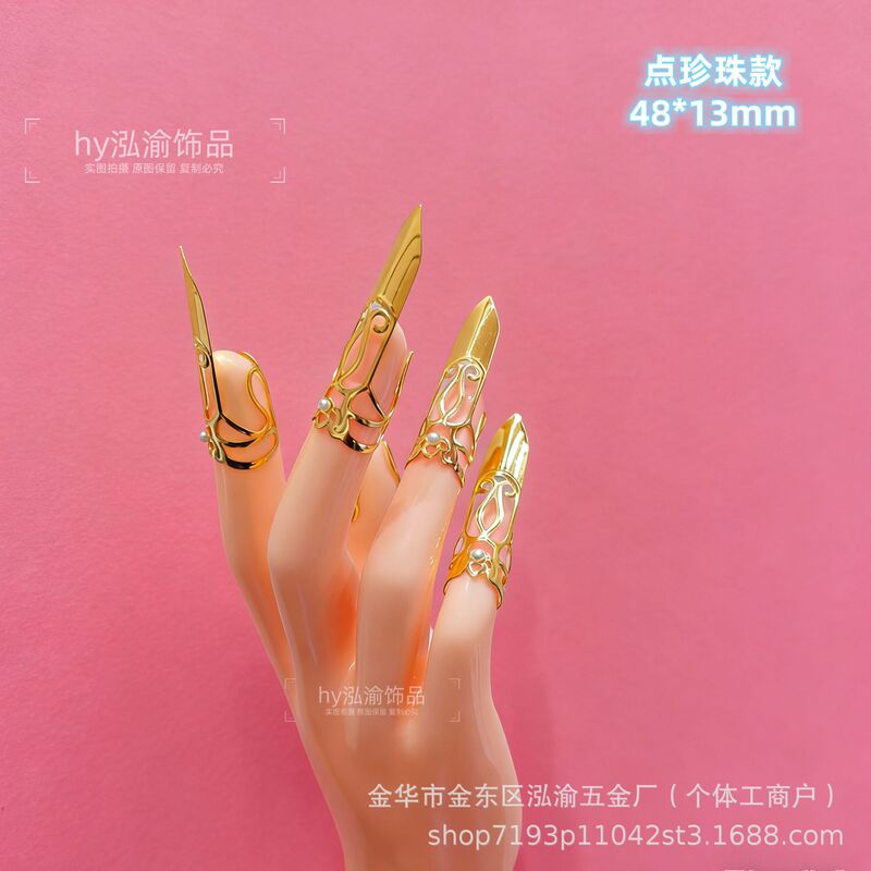 Metal hollow-out finger cots with irregular lines, open design, suitable for Hanfu dance, finger accessories, and for scratching or protecting the nails Metal hollow-out finger cots with irregular lines, open design, suitable for Hanfu dance, finger accessories, and for scratching or protecting the nails