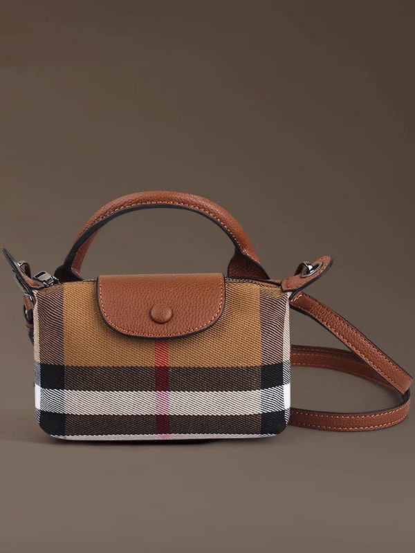 Bolsos pequeños de venta caliente de comercio exterior para mujer 2025 nuevo bolso bandolera salvaje textura celebridad de Internet estilo caliente bolso de teléfono móvil de alta gama