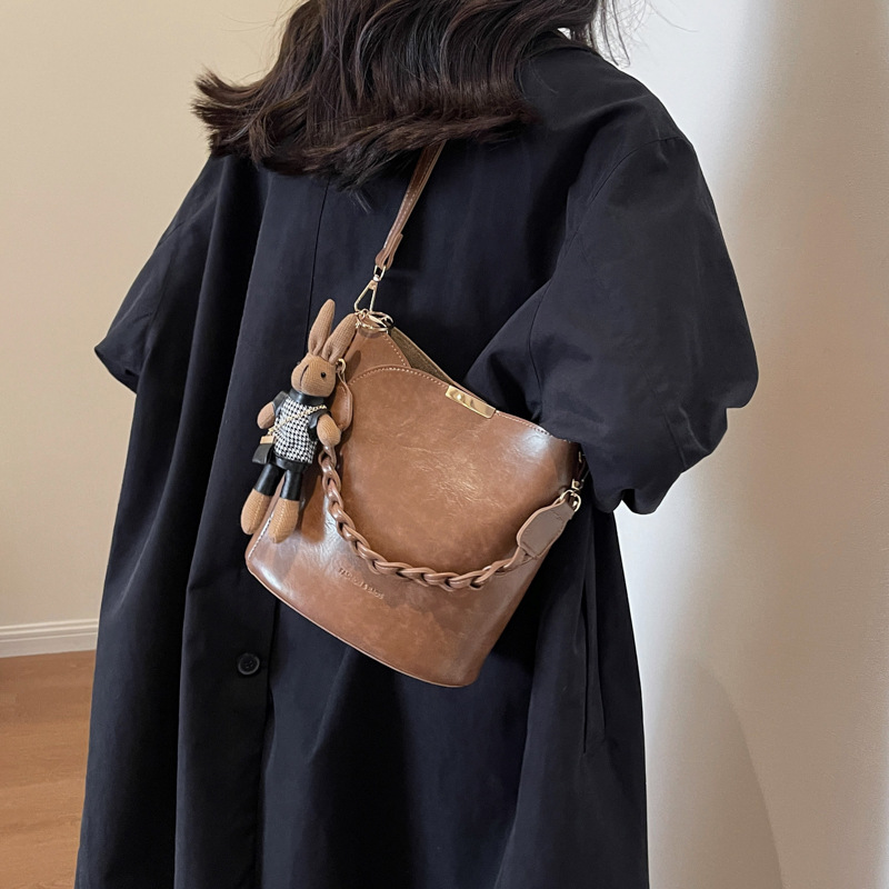 Cross-border retro nicho bolso de cubo para mujeres 2025 nuevo tipo de mochila casual de moda textura versátil bolso de hombro portátil