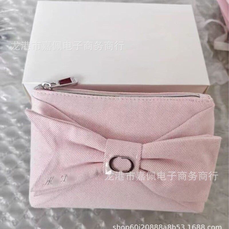 Makeup gift, denim fabric, affordable alternative to designer brands, new Korean evening bag, bow clutch, coin purse, women's bag Makeup gift, denim fabric, affordable alternative to designer brands, new Korean evening bag, bow clutch, coin purse, women's bag