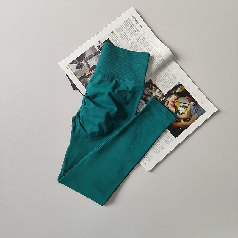 Pantalones de gimnasio sin costura europeos y estadounidenses, cintura alta, abdomen, caderas, pantalones de melocotón para correr, yoga, leggings apretadas