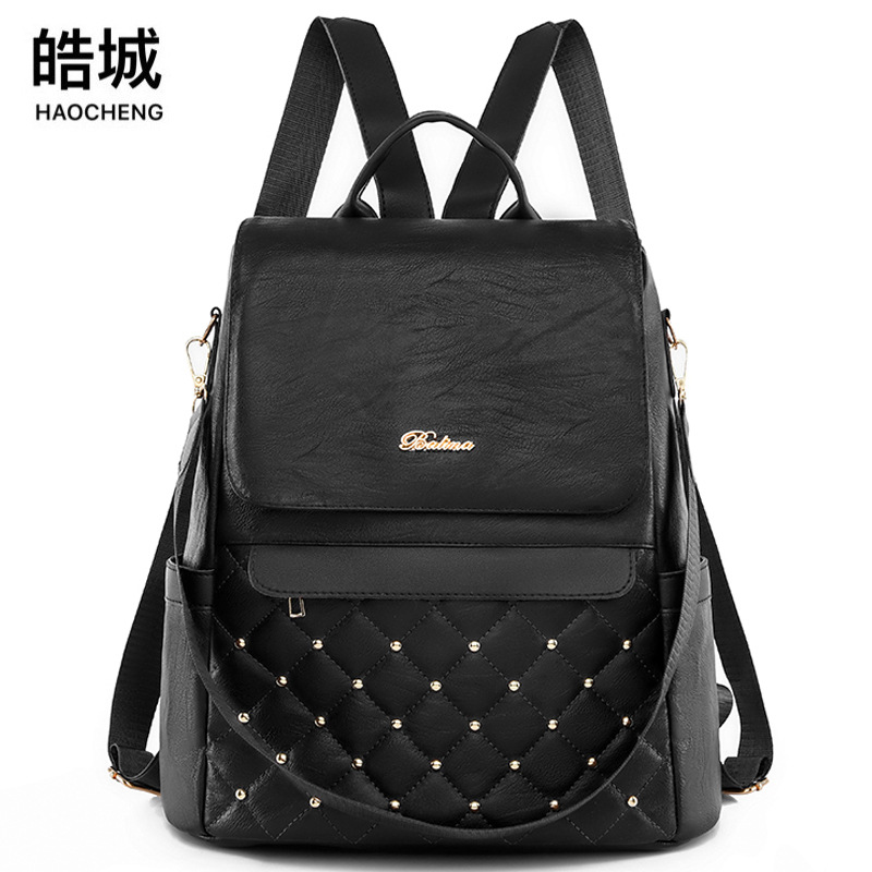 Comercio exterior al por mayor 2023 nuevo estilo casual señoras cuero suave mochila antirrobo moda rombo doble uso mochila ligera marea