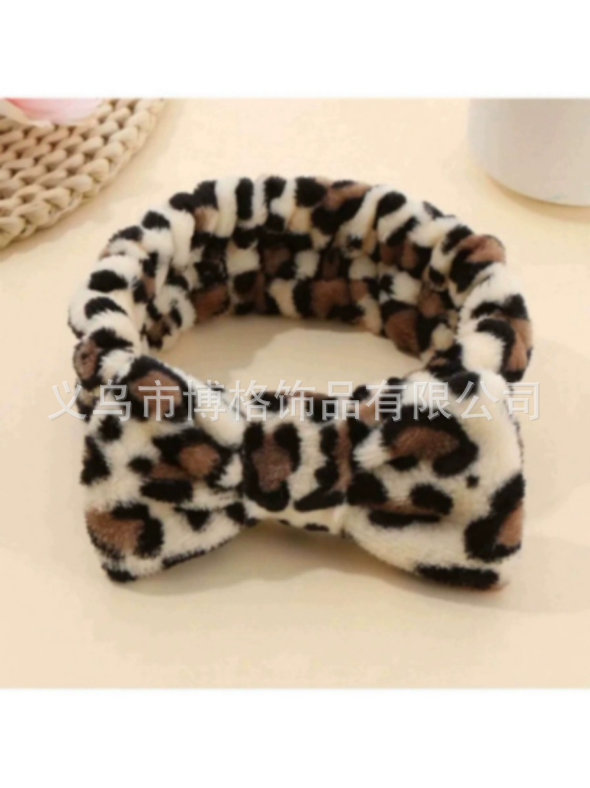 Europa y América leopardo punto ondulado coral veludo correa de cabello mariposa final correa de cabello lavado facial maquillaje turbante fábrica de cabello al por mayor
