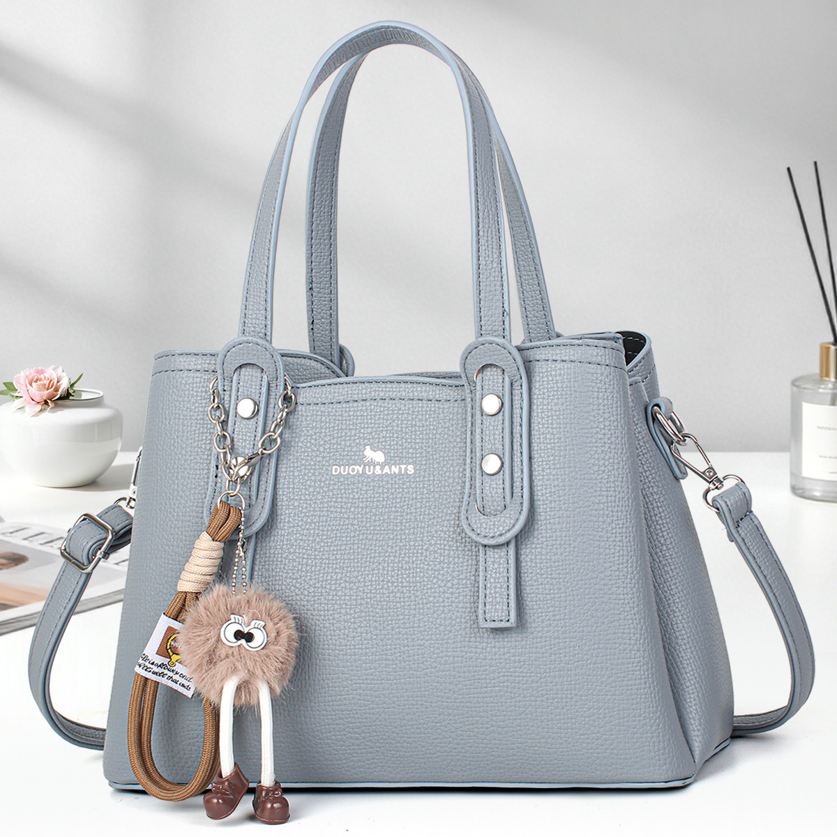 Casual muñeca colgante bolsos de mano simple bolsos de hombro de color sólido bolsos de moda bolsos transfronterizos