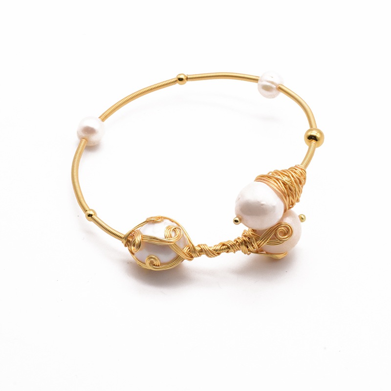 Pulseras de perlas de alto nivel nuevo retro europeo y americano cruzado pulseras de perlas de agua dulce abiertas pulseras al por mayor natural
