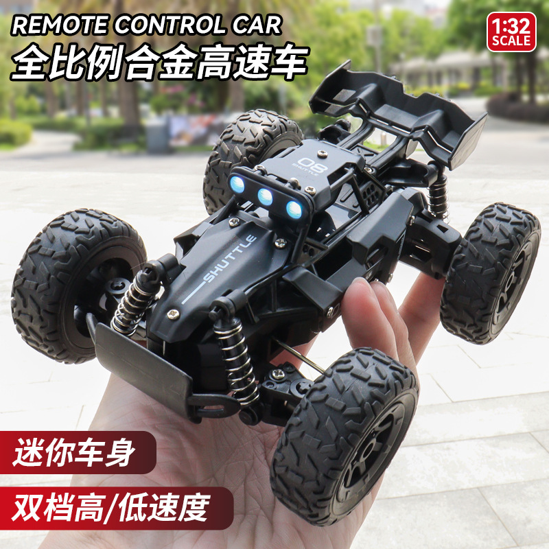 1:32Mini Handheld Alloy High-Speed Remote Control Car 2.4g Proportional Throttle Light Off-Road Climbing Remote Control Model