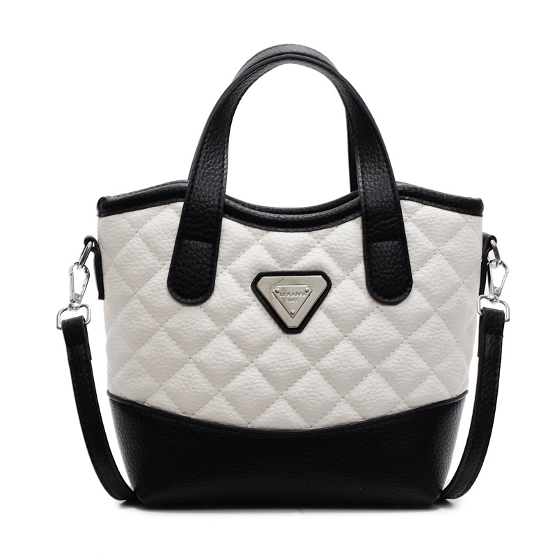 Bolso de mano de alta sensación lingue versátil para mujeres 2025, nuevo color extranjero, bolso de hombro, bolso de cubo de explosión