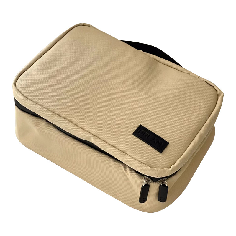 2024 nueva bolsa de cosméticos pu simple moda partición impermeable bolsa de almacenamiento de cosméticos bolso al por mayor de la fábrica