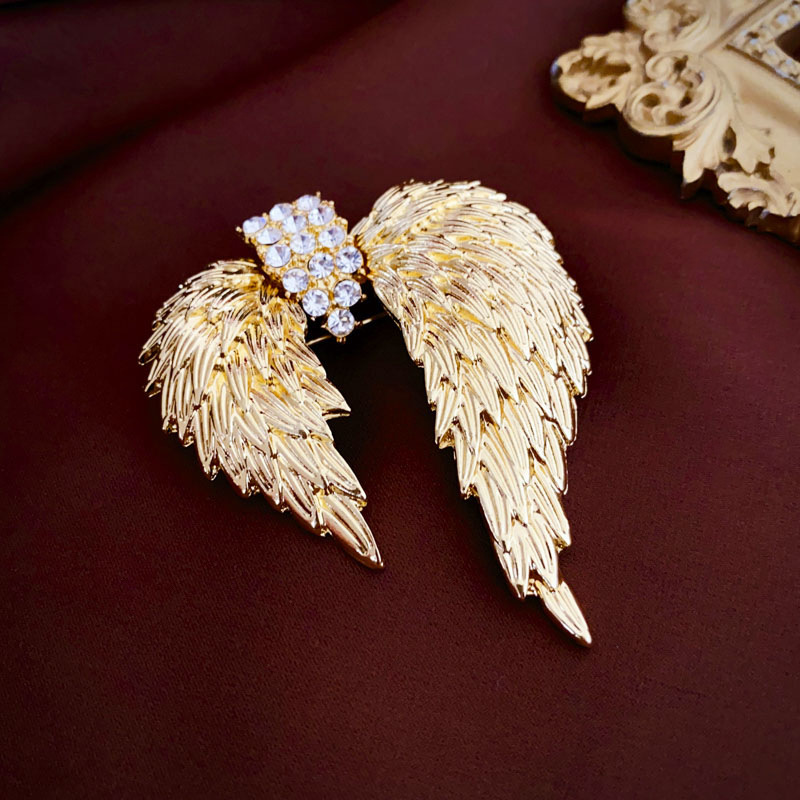 Retro diamante-incrustado alas asimétricas broche francés metal moda anti-exposición elegante de alto grado PIN ramillete para las mujeres